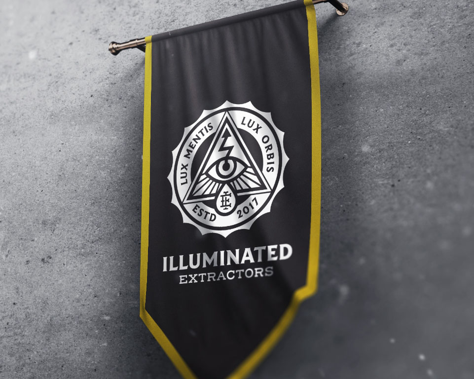 Illuminated Extractors banner hanging on gray wall